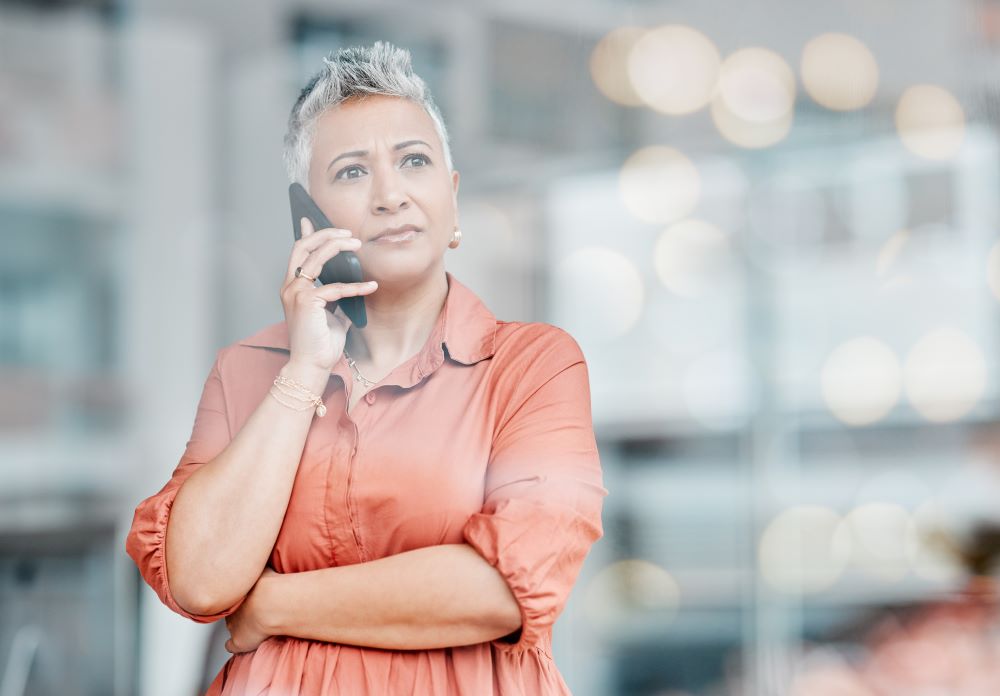 Concerned woman on the phone